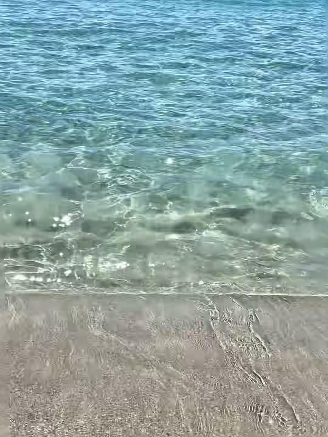 海浪退潮时的沙画，随手一拍像在给沙滩写情书🌊